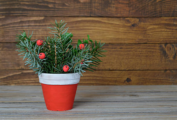 istock Christmas arrangement in clay pot 537607650