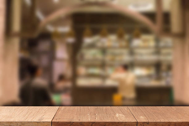 istock table for display product with blur beverage at counter bar 537607698