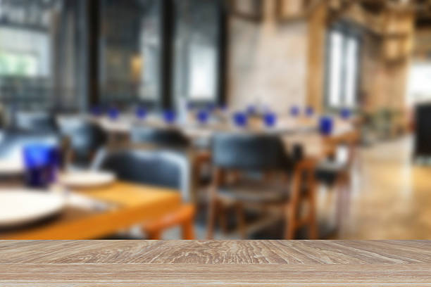 istock wooden table for display product with blur cafe coffee shop 537607864