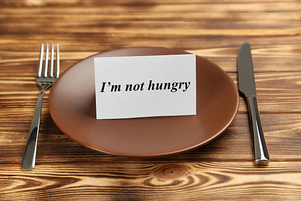 istock Brown plate on a brown wooden table 537608276