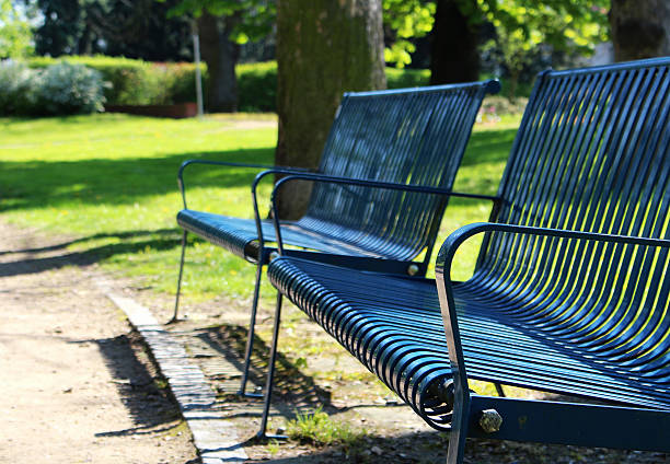 istock Detail of blue bench at spring park 537608544