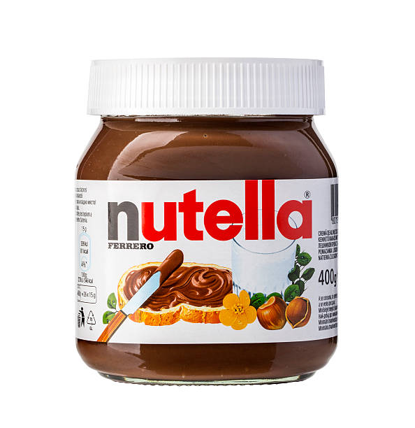 Jar of Italian Nutella hazelnuts cream Chisinau, Moldova- December 25, 2015: : Jar of Italian Nutella hazelnuts cream made by Ferrero NUTELLA stock pictures, royalty-free photos & images
