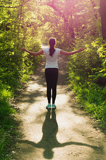 istock Girl recovers force after exercise in the park 537609798