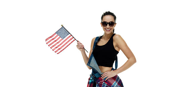 istock Woman posing with American flag 537610374