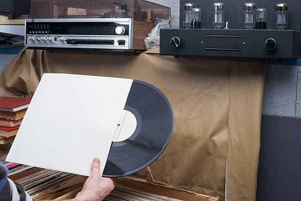 browsing through vinyl records collection. music background. copy space. retro - lp jazz stockfoto's en -beelden