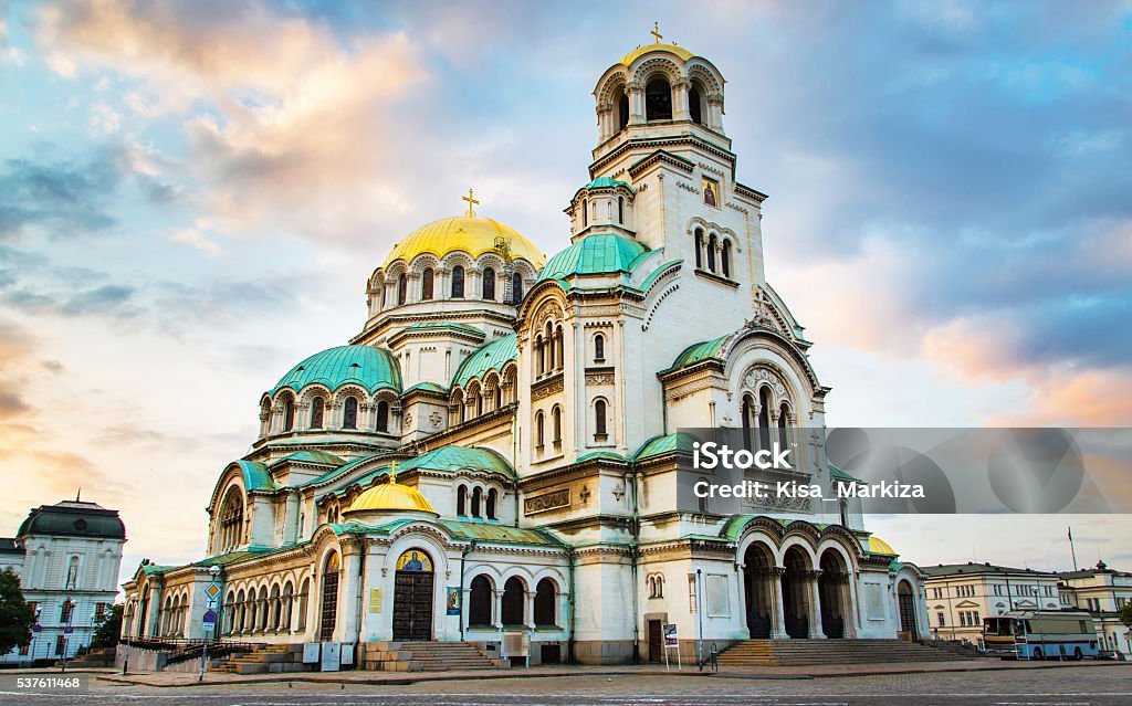 St. Alexander Nevski Cathedral in Sofia, Bulgaria St. Alexander Nevsky Cathedral in the center of Sofia, capital of Bulgaria against the blue morning sky with colorful clouds Sofia Stock Photo