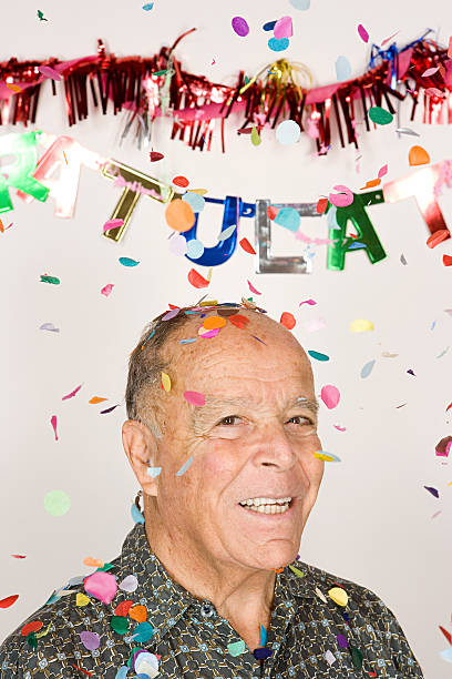 istock Senior man at a party 537612255