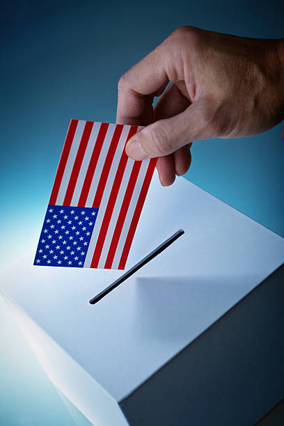 istock U.S. Election Voter Voting Ballot Over Ballot Box 537612870