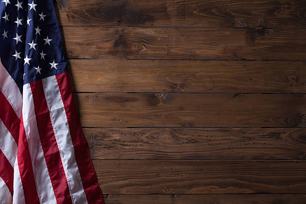 istock USA flag on wooden wall texture 537614436
