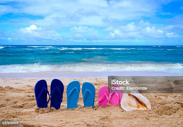 Color Flip Flops Next To Ocean Stock Photo - Download Image Now - 2015, Arts Culture and Entertainment, Beach