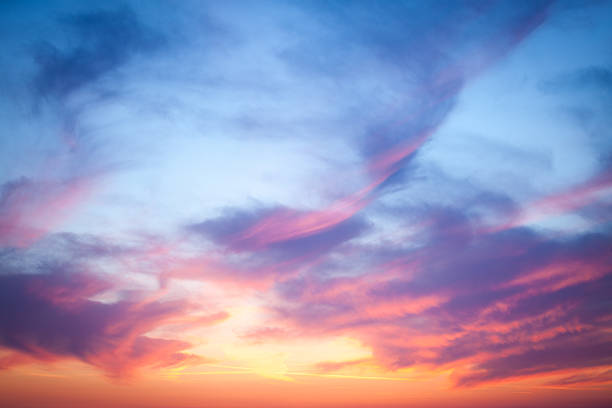 разноцветный облака на закате - nobody dusk dark overcast стоковые фото и изображения