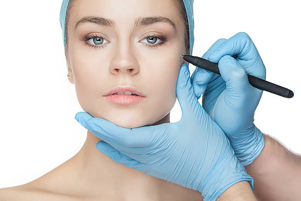 istock Beautiful young woman before plastic surgery operation. 537617856