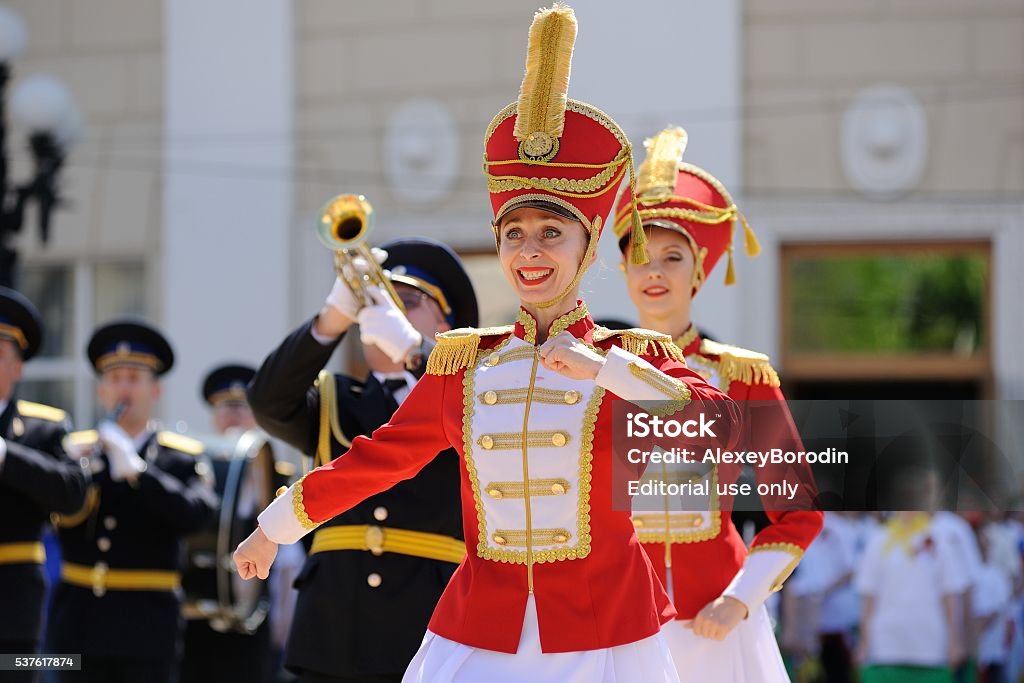 Celebration of 71th anniversary of the Victory Day (WWII). Orel, Russia - May 9, 2016: Celebration of 71th anniversary of the Victory Day (WWII). Hussars dressing dancers and military brass band Adult Stock Photo