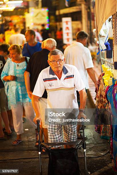 Caucasian Senior With Walker In Hua Hin Stock Photo - Download Image Now - 2015, Adult, City