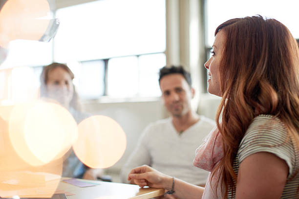 Unposed group of creative business people in an open concept