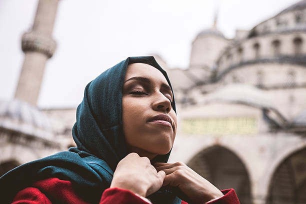 istock Muslim woman wearing headscarf 537618407