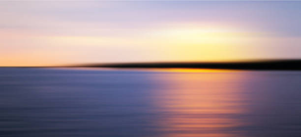 istock Colorful sunset over sea coast. Blurred photo 537619532