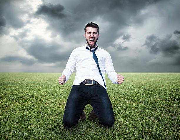 istock Happy screaming business man on the lawn 537619728