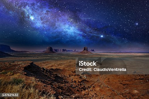 istock starry night sky in monument valley 537621432