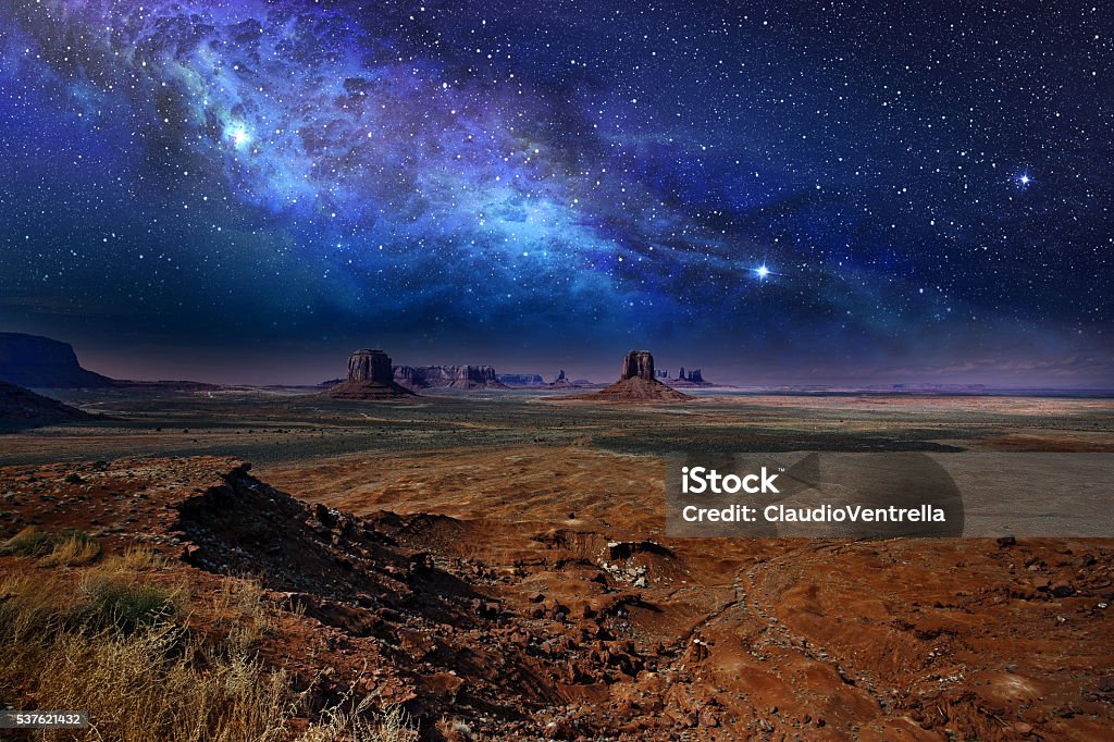 starry night sky in monument valley starry night sky over the monument valley Night Stock Photo