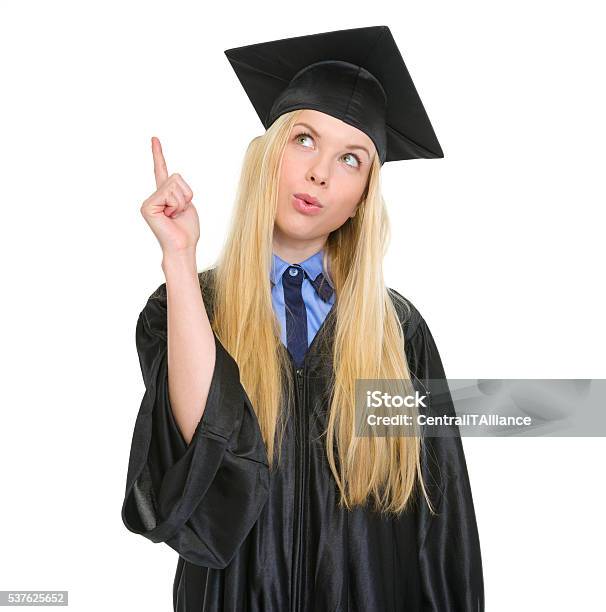 Happy Young Woman In Graduation Gown Got Idea Stock Photo - Download Image  Now - Adult, Aspirations, Blond Hair - iStock