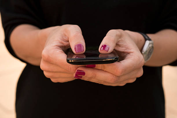 istock Close up of smart phone in hands 537625888