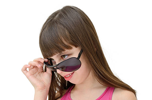 istock Young girl with glasses isolated on white background 537628342