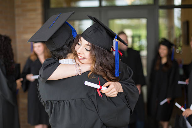 istock Educaton: Diverse group of college students graduating 537629958