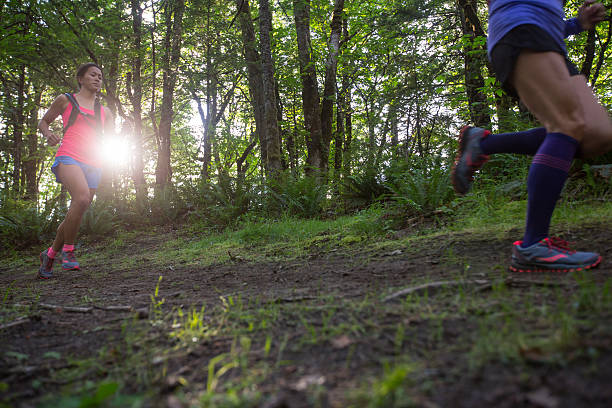 istock Ultra marathon runners running outdoors in nature 537630394