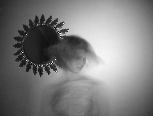 istock Mirror and woman how turn his head BW 537631272