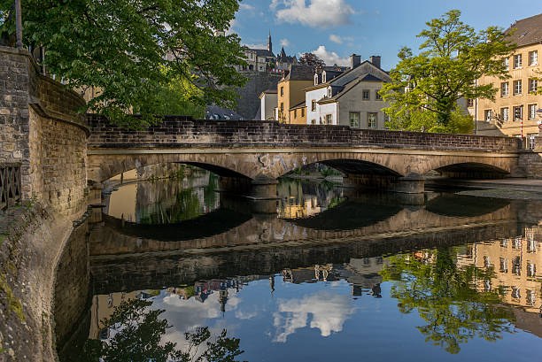 istock Stone bridge reflecting in the Alzette river in Luxembourg 1 537635220