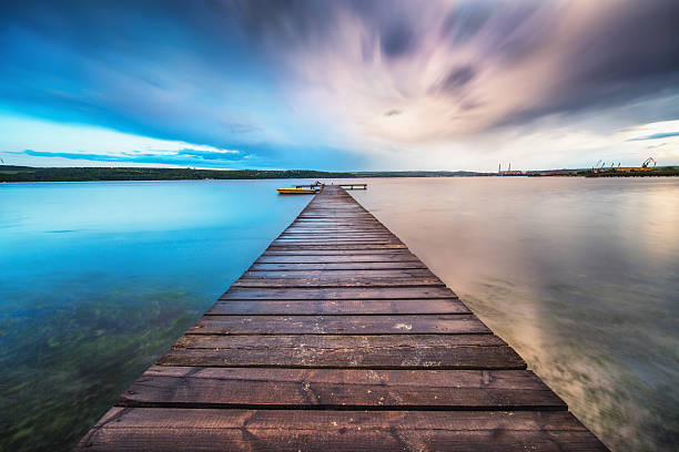 istock Small Dock and Boat at the lake 537635934
