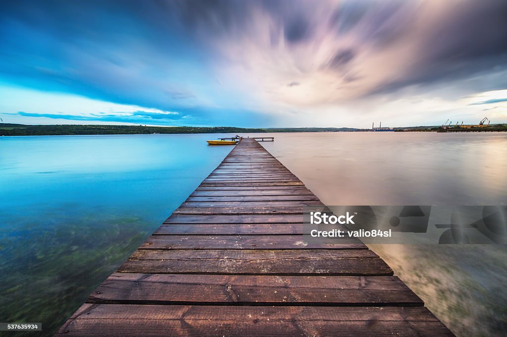 Small Dock and Boat at the lake Pier Stock Photo