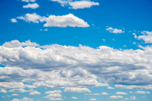 White stratocumulus clouds against a blue sky