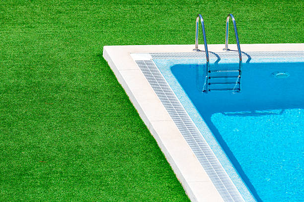 istock Swimming pool with stair in hotel resort 537639182