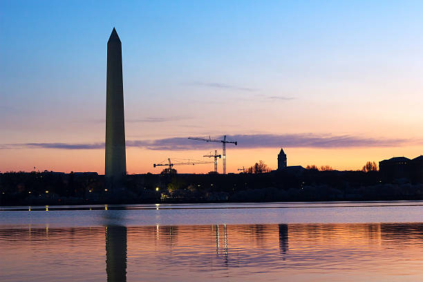 istock Washington Monument at dawn with the city skyline on background. 537640781