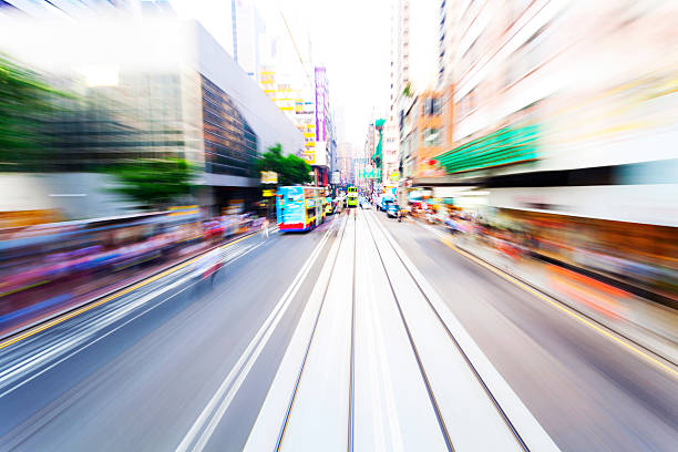 istock traffic blur motion in modern city hongkong 537641049