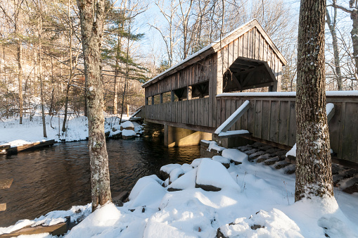Covered bridge on winter day in Devil's Hopyard State Park
