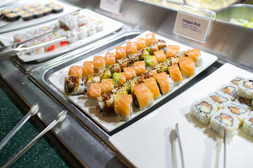 Various sushi buffet rolls at self serve station