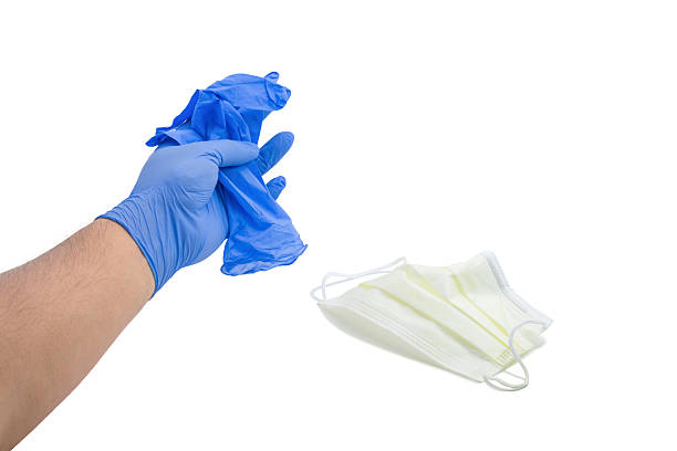 istock Man Wearing And Holding Latex Gloves 537642289