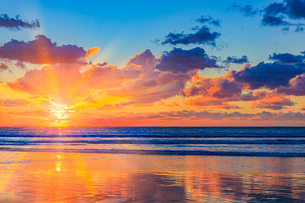 istock Southern California sunset seascape with reflections breaking surf 537643784