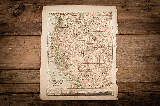 Western United States Map Illustration, Travel, Antique 1871 Book Page Color stock photo of an antique Western United States map illustration page on an old, wooden trunk. Salvaged from an 1871 geography book. topographic map photos stock pictures, royalty-free photos & images