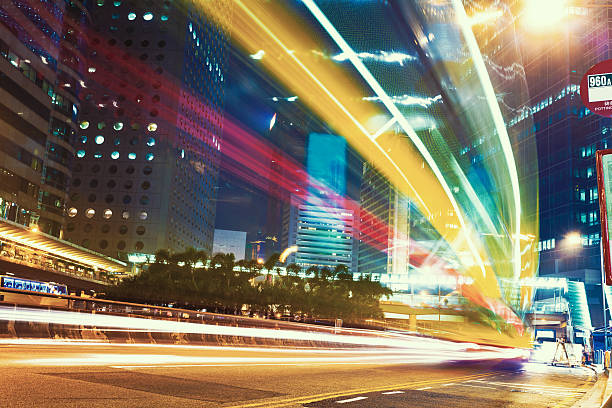 istock traffic light trails in modern city at night 537645241
