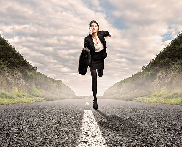 istock businesswoman on a road 537645811