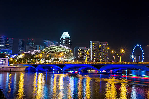 istock Singapore city skyline night 537662905