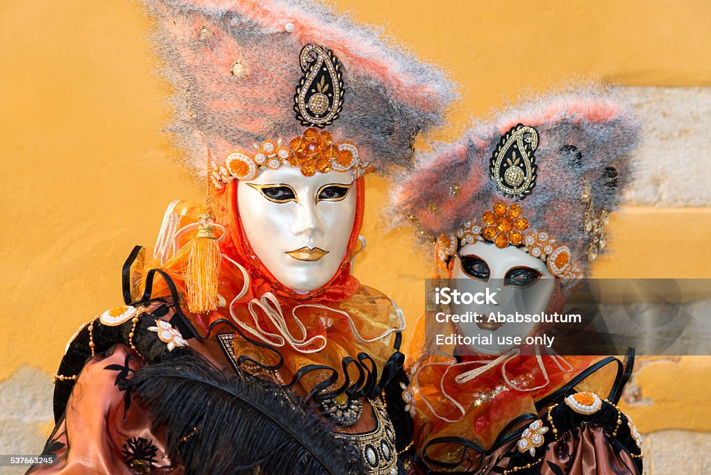 Portrait of Beautiful Masks, Venice Carnival at Arsenale, Italy, Europe Venice, Veneto, Italy - March 3rd, 2014: Beautiful masks, participants of the 2014 Carnival celebrations, posing for casual photographers and tourists at Arsenale. 2015 Stock Photo