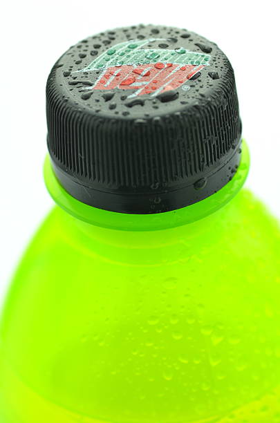 Kwidzyn, Poland - March 31, 2014: Bottle of Mountain Dew drink isolated on white. Mountain Dew citrus-flavored soft drink produced by PepsiCo. Mountain Dew was introduced in 1940