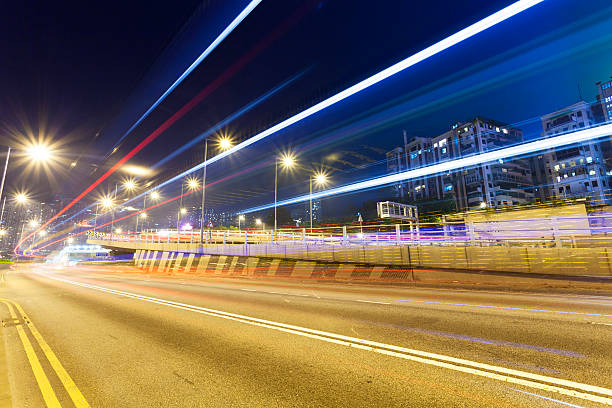 istock traffic light trails in modern city at night 537675133