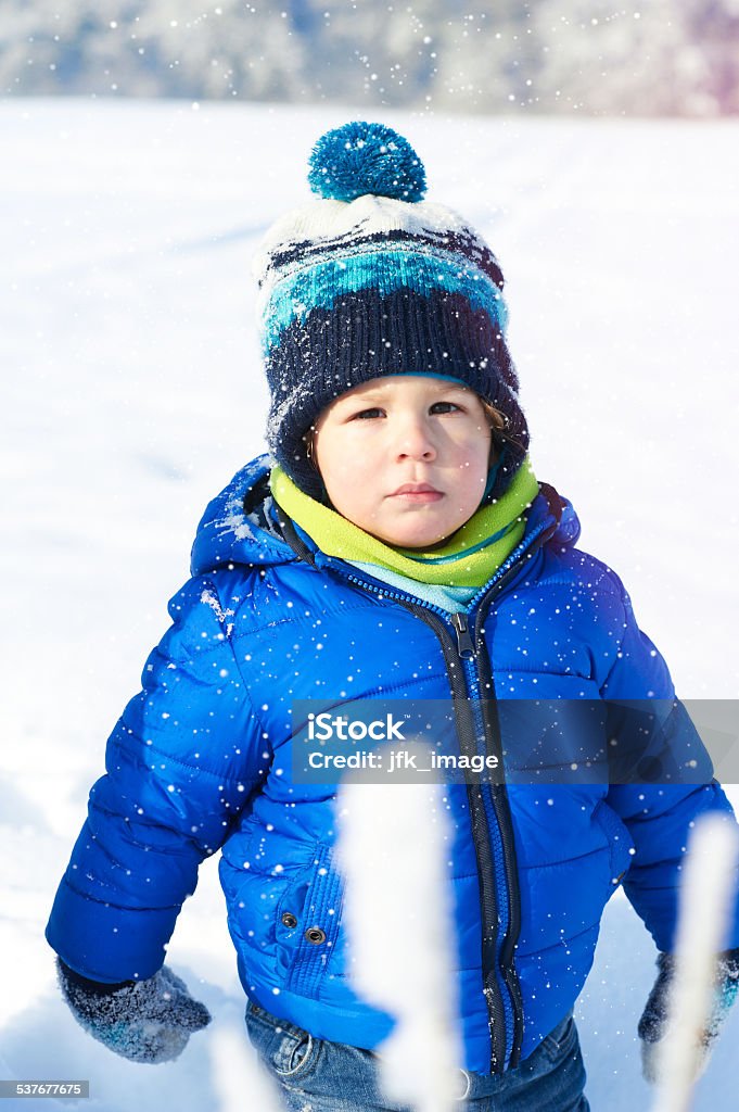 Happy 2 years baby boy on walk in winter park Portrait of baby boy in winter day 2015 Stock Photo