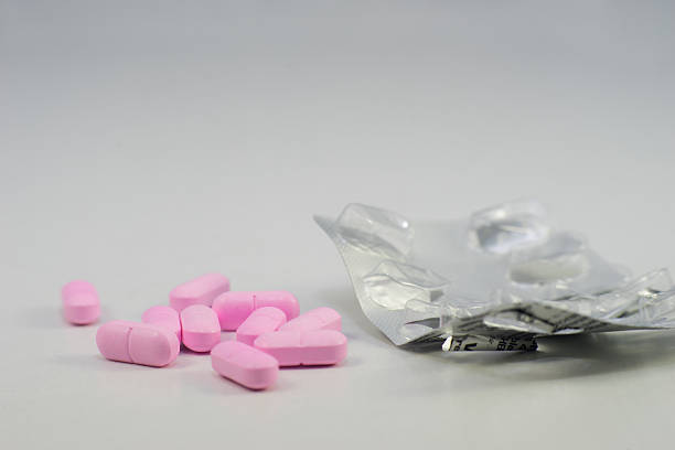 istock Close up of pink pills within a pack 537686982
